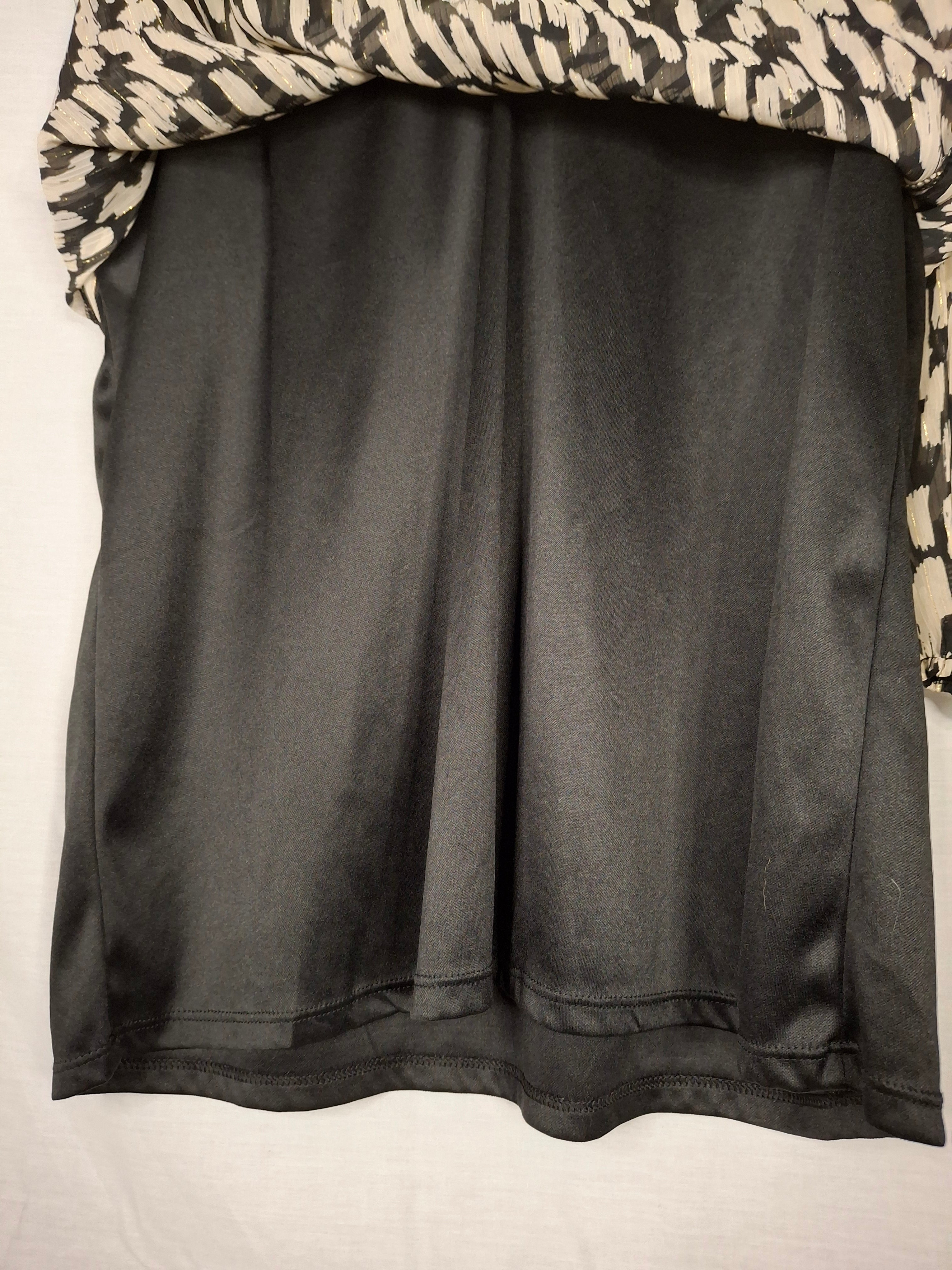 Blouse manches 3/4 marque inconnue  – Noire tâchetée écru  - 40 (L)